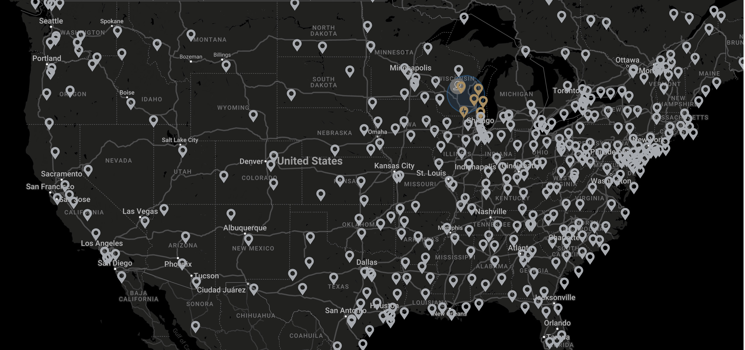 A simplified U.S. map with pins marking Mack Dealerships across the country