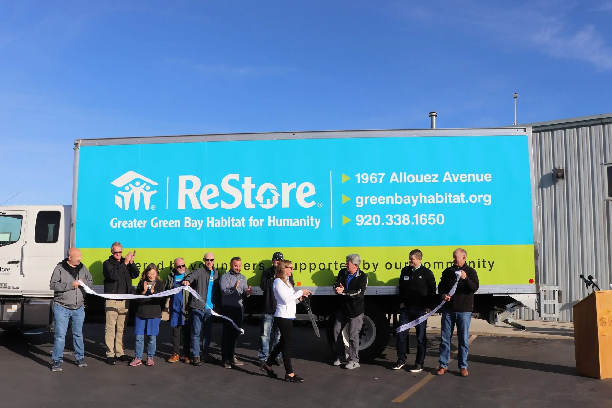 Habitat for Humanity ribbon-cutting group photo