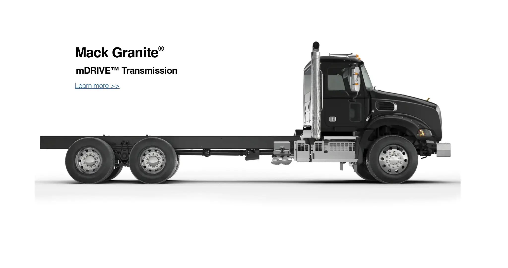 A granite black Mack truck, side-on