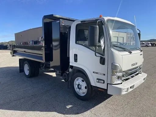 White and black Isuzu NRR Gas truck
