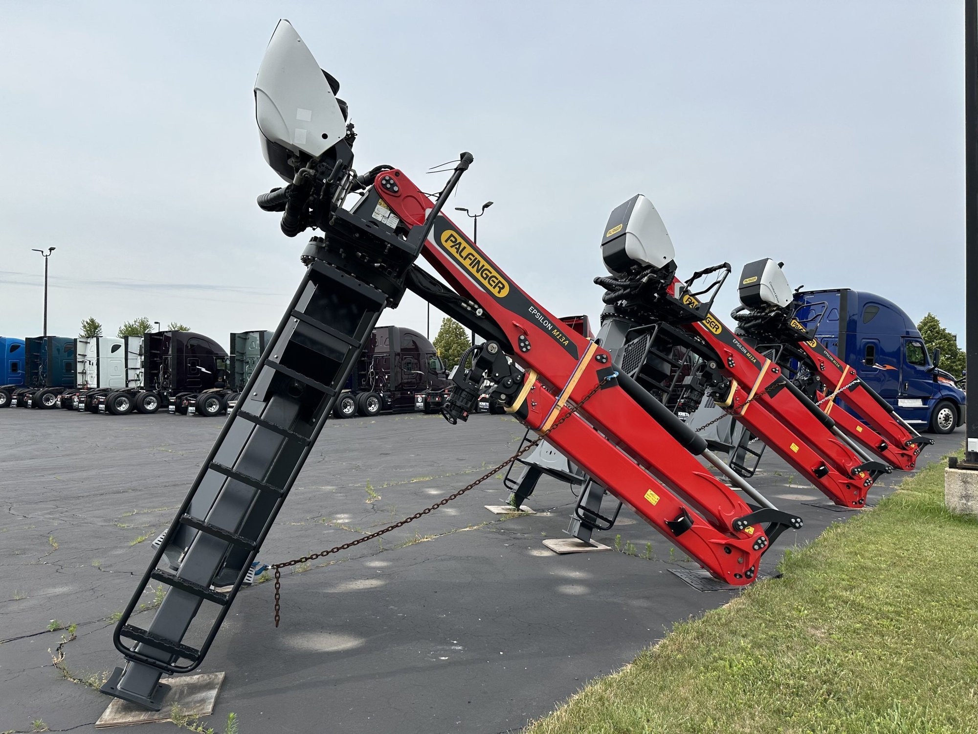 A row of Sheboygan Palfinger Loaders
