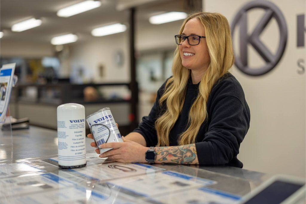 On Demand Parts Support staff member Beth working behind the counter