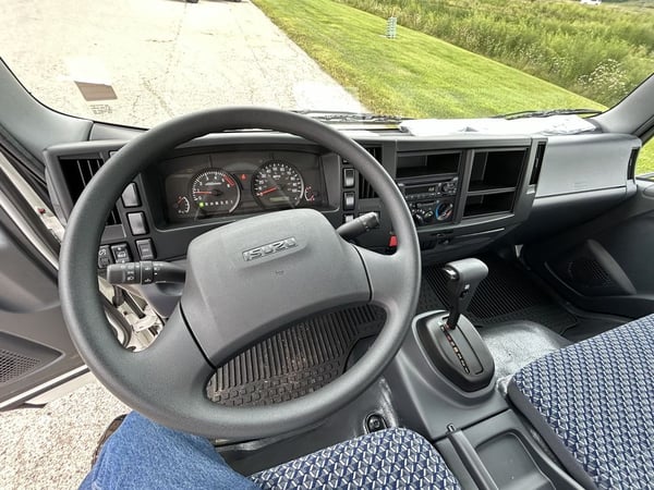 Slide images of 2024 ISUZU NRR GAS