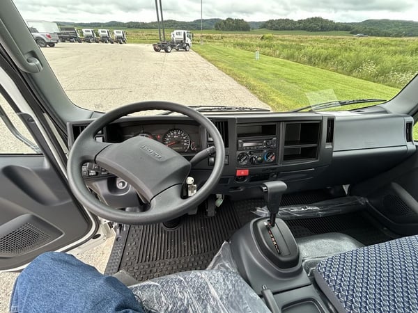 Slide images of 2024 ISUZU NPR-HD GAS