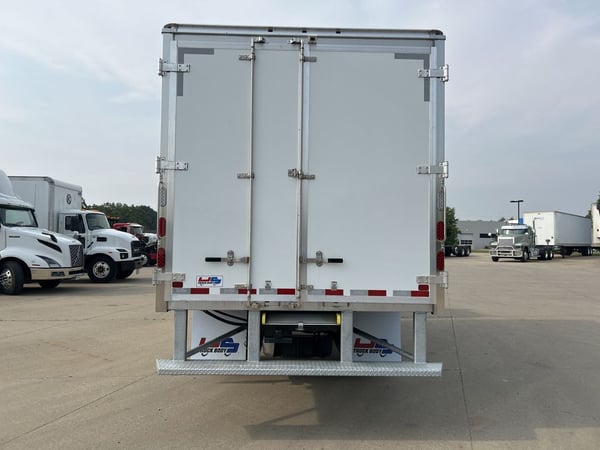 Slide images of 2024 ISUZU NPR-HD GAS