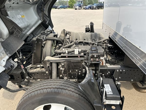 Slide images of 2024 ISUZU NPR-HD GAS