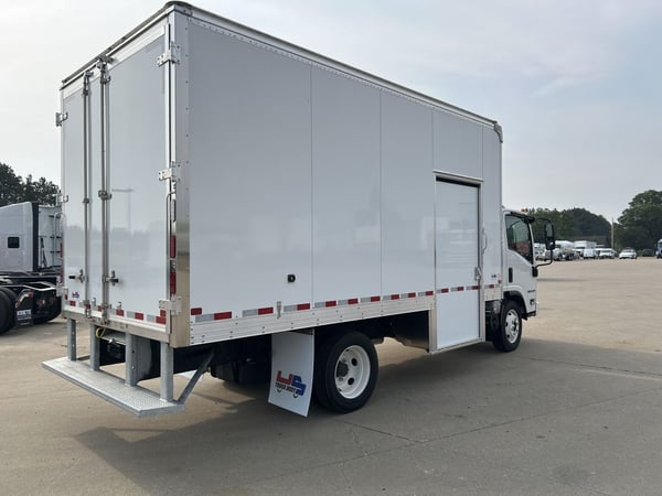 Slide images of 2024 ISUZU NPR-HD GAS
