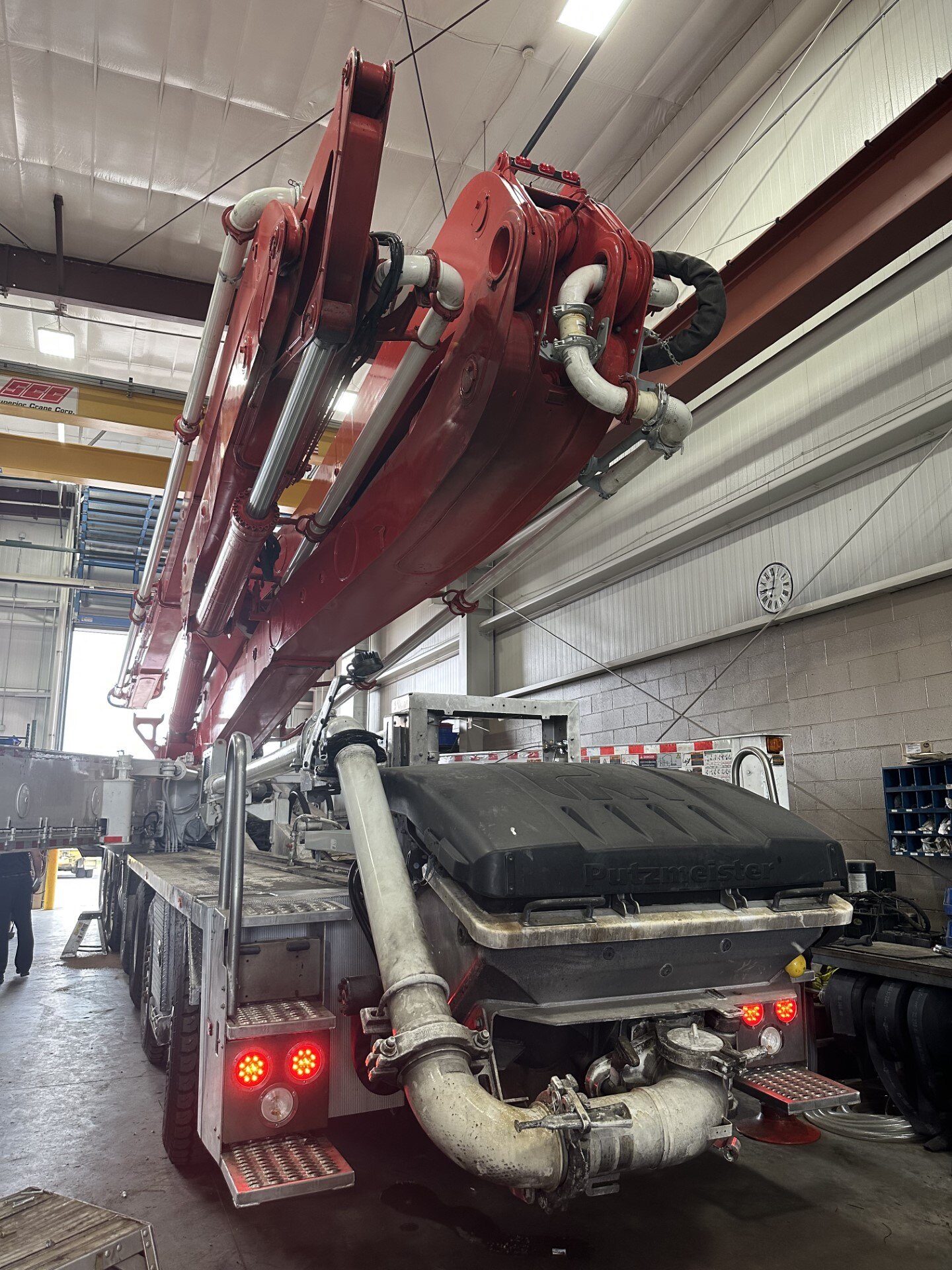 A 61 meter concrete pumper mounted on a large truck