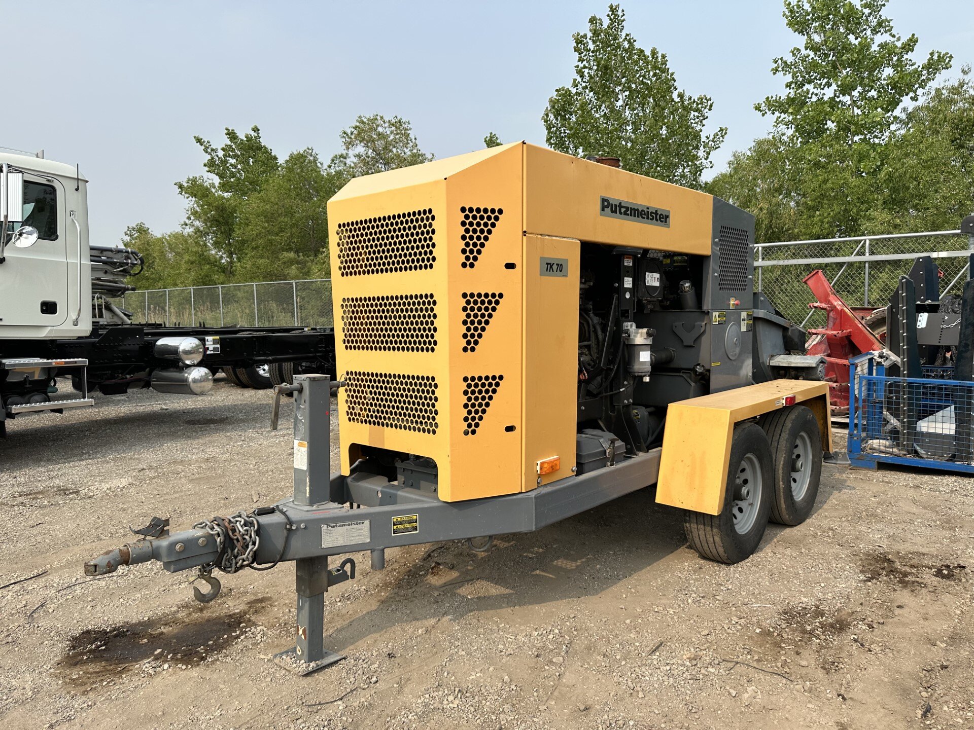 A yellow concrete pump