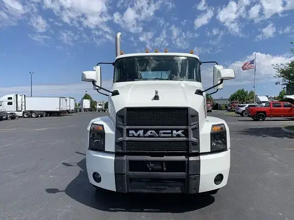 Pristine white Mack truck seen from the front